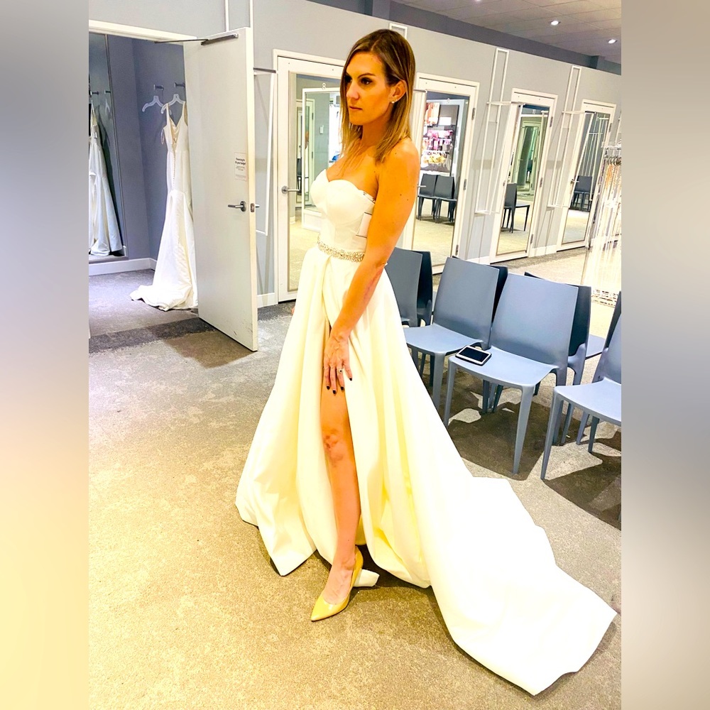 Brand New with Tags and unaltered gorgeous classic elegant wedding dress.
